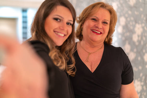 istock Mother and daughter taking a selfie at Home 1038472198