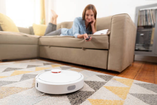 istock Robotic vacuum cleaner cleaning the room 1038490440