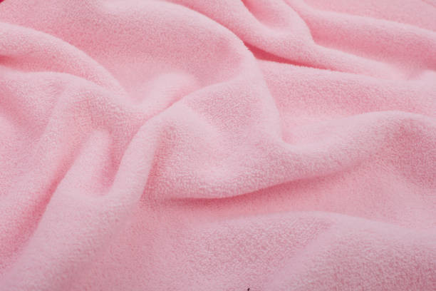 istock Full page close up of pink fabric texture. 1038494644