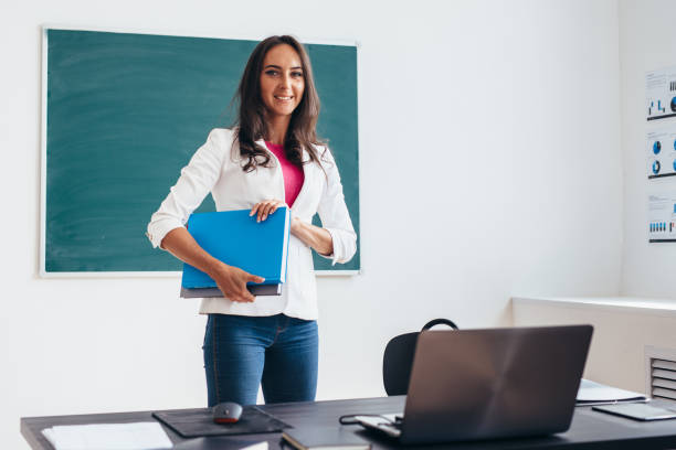 istock Young teacher or student smiling and looking at camera. 1038525562