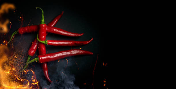 chili peulen - chili fire stockfoto's en -beelden