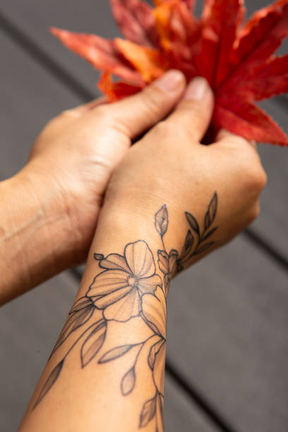 istock Hand holding autumns leaves 1038566846
