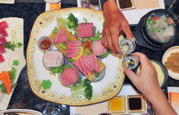 istock Drink soju with tuna sashimi 1038567098