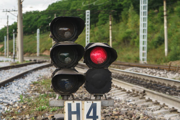 istock railway traffic light at the station 1038574112