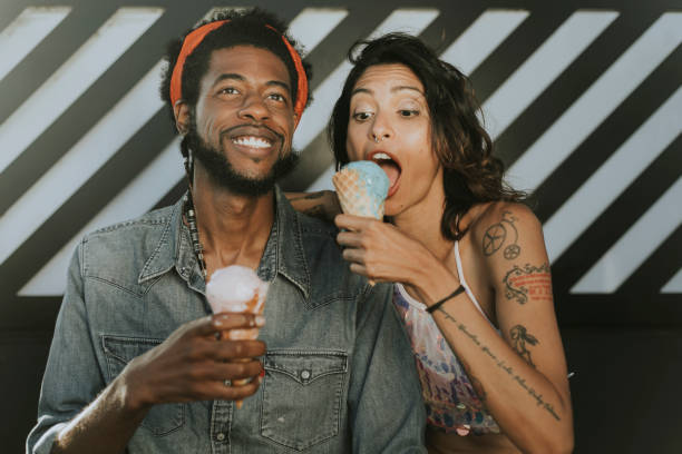 istock Cheerful couple enjoying ice cream 1038582760
