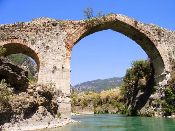 Photo of Panorama view to old ruined bridge over Dalaman river, Turkey