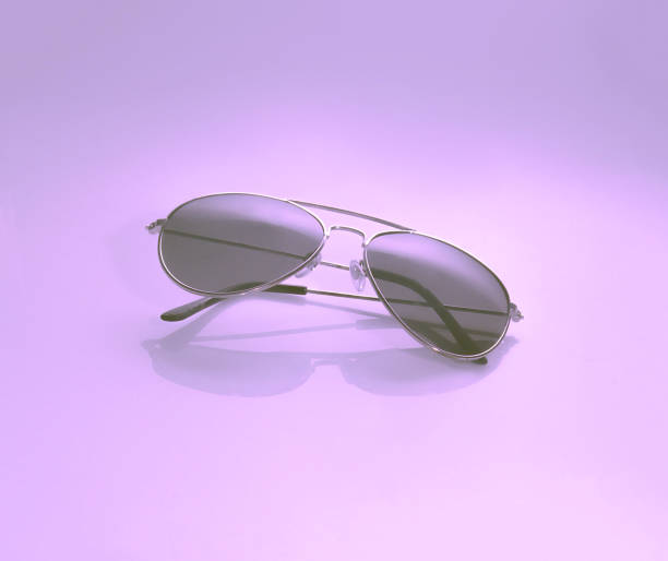 istock Sunglasses on trendy pink background. 1038599562