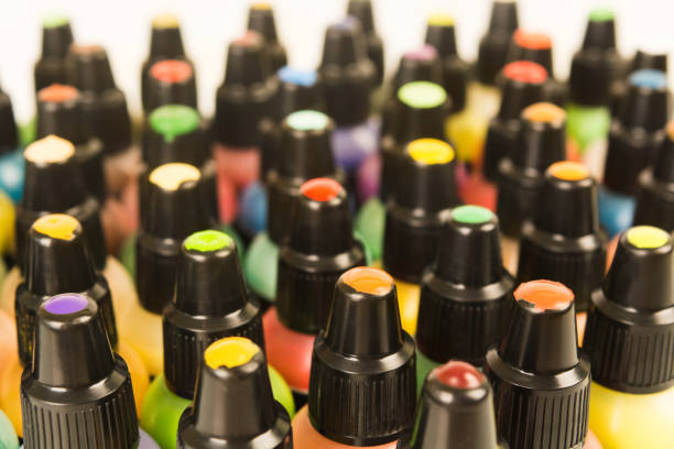 istock Small plastic bottles with colorful paint for arts with samples on cover 1038606148