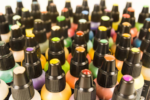 istock Small plastic bottles with colorful paint for arts with samples on cover 1038606332