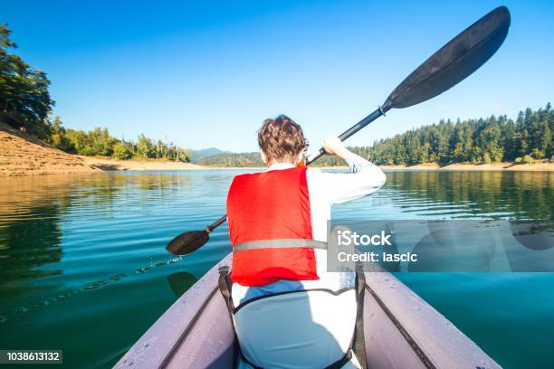 Strong Young Girl Kayaking Stock Photo - Download Image Now - Activity, Adventure, Athleticism