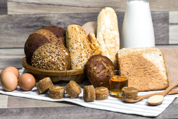 istock Milk and Bread on Wood Table,Milk,bread 1038620790
