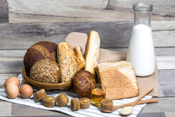 istock Milk and Bread on Wood Table,Milk,bread 1038621036