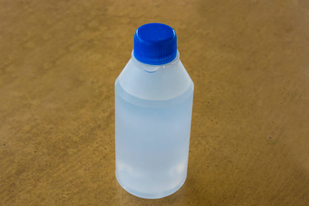 hydrogen peroxide medicine white plastic bottle closeup hydrogen peroxide medicine white plastic bottle closeup on wooden table hydrogen peroxide stock pictures, royalty-free photos & images