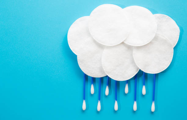 istock Cloud and rain made of cotton swabs and cotton discs 1038629542