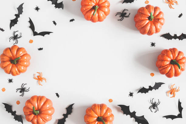 istock Halloween decorations on pastel gray background. Halloween concept. Flat lay, top view, copy space 1038633742