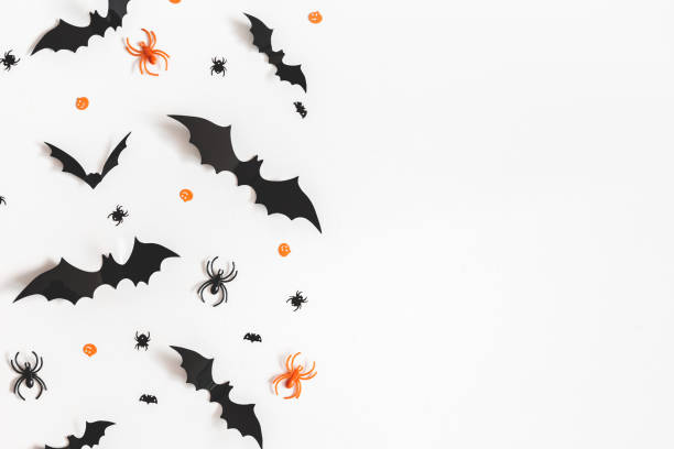 Halloween decorations on white background. Halloween concept. Flat lay, top view, copy space