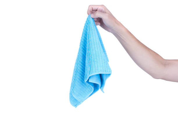 istock Hands holding cleaning rag microfiber cloth isolated on white background 1038642956