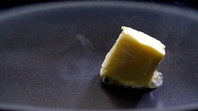 Butter on a frying pan.
