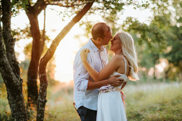 istock Beautiful young couple in nature 1038661696