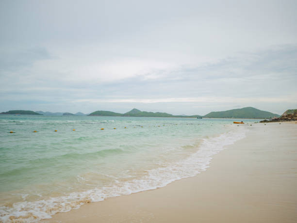 istock Tropical Idyllic ocean Blue sky and beautiful Beach in vacation time 1038662648