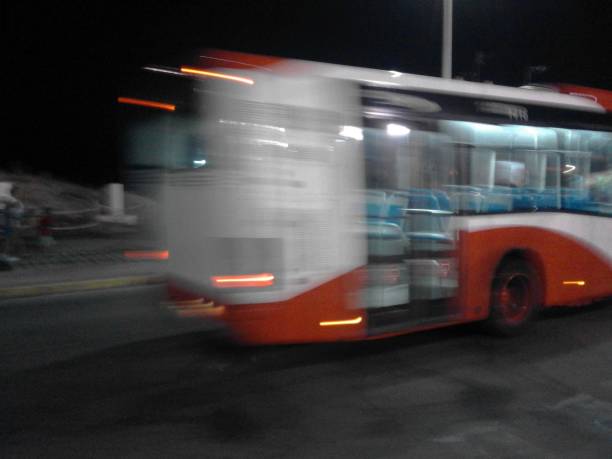 istock An abstract image of a red and white urban bus in movement 1038666492