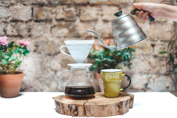 istock Coffee Brewing Time, Coffee Mug and Drip Coffee 1038666684