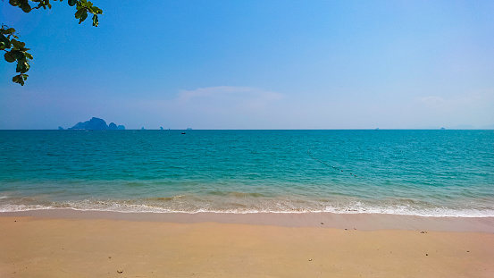 Tropical Idyllic ocean Blue sky and beautiful Beach in vacation time,Holiday on the beach,krabi thailand.Summer concept.