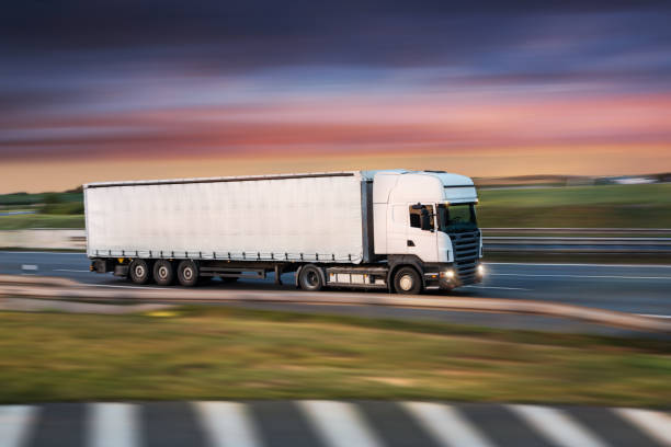 istock Small Truck on road, cargo transportation concept. 1038680306