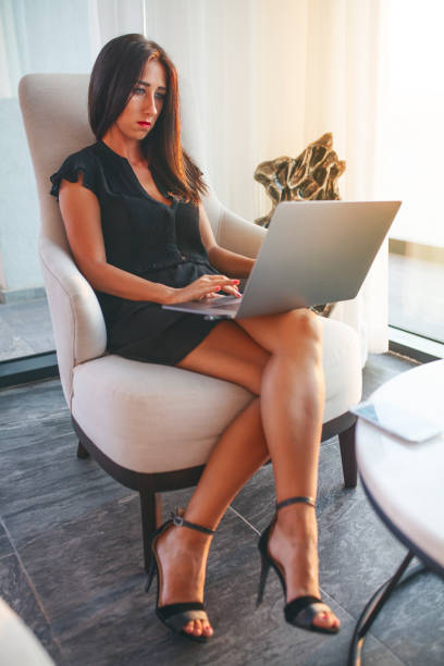 istock Young businesswoman looking at laptop 1038683132