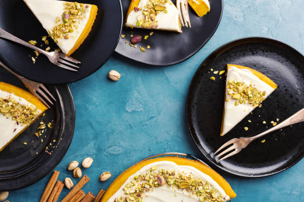 istock Pimpkin pie with cream and pistachios 1038684904
