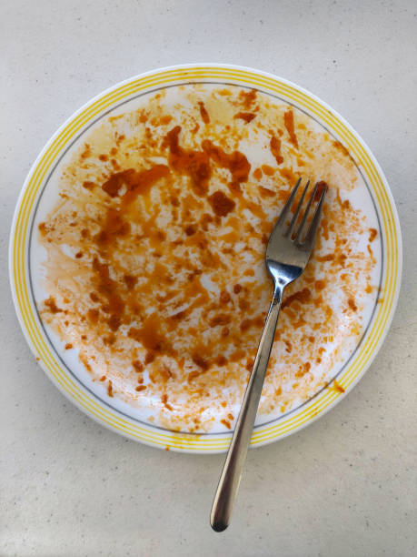 istock Dirty and greasy plate top view 1038685326