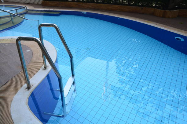 istock Pool ladder on swimming pool 1038690934