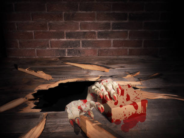 istock Zombie hand through hole cracked in rustic wood.Halloween theme 1038691772