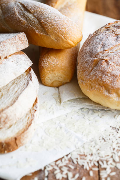 istock Fresh baked bread and sliced bread on rustic wooden table 1038701206