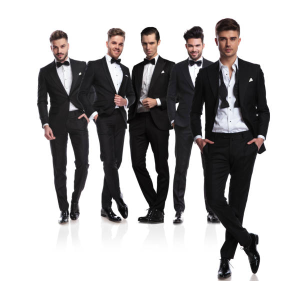 istock five groomsmen with leader with undone collar in front 1038703702