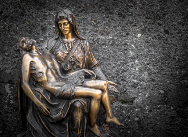 istock Religious bronze statue representing the piety of Michelangelo 1038712678