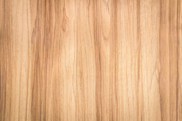 Brown wood background with abstract pattern. Surface of natural wooden material. Brown wood background with abstract pattern. Surface of natural wooden material. pine wood material stock pictures, royalty-free photos & images