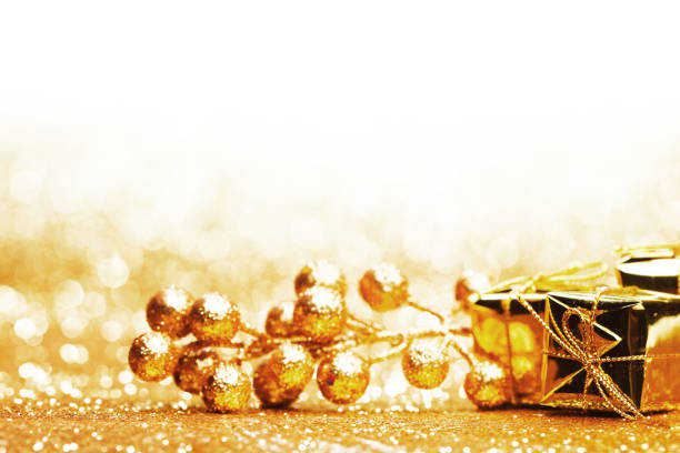 istock Shiny Golden christmas decor over glitter background 1038729290