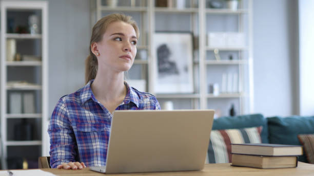 istock Upset Woman Working on Laptop in Office 1038739378