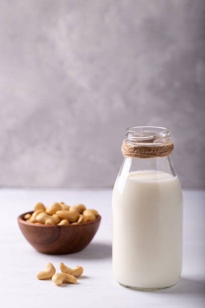 веганский немолочный овсяное молоко - soybean merchandise soy milk milk стоковые фото и изображения