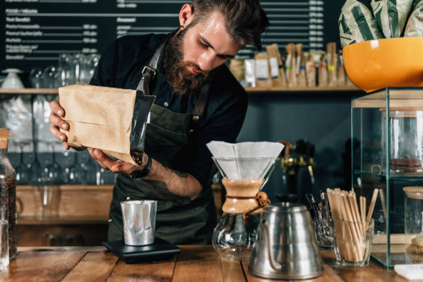 istock Barista Weighs Coffee On A Digital Scale 1038754186