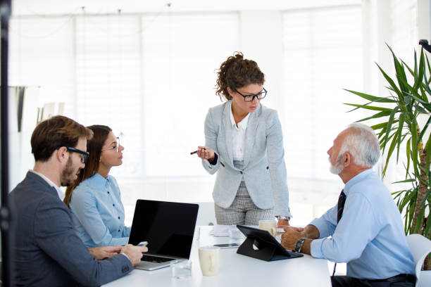 istock Partners discussing their business development in a meeting 1038768988