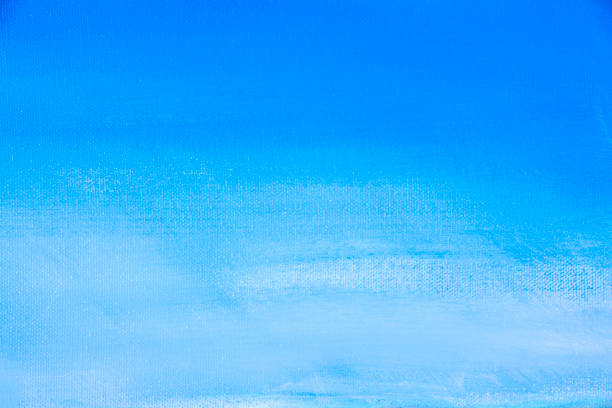 istock Full frame graduated blue sky background, acrylic painting technique detail. 1038775576