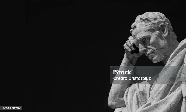 Thinking Man Statue Stock Photo - Download Image Now