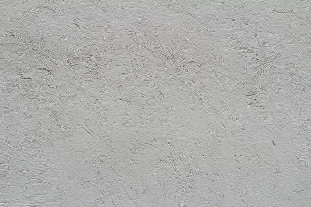 istock white cement wall texture of concrete material background 1038779928
