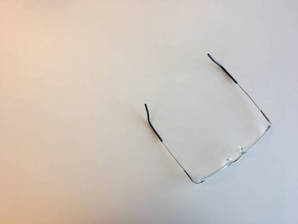 istock Titanium glasses on a white desk 1038786412