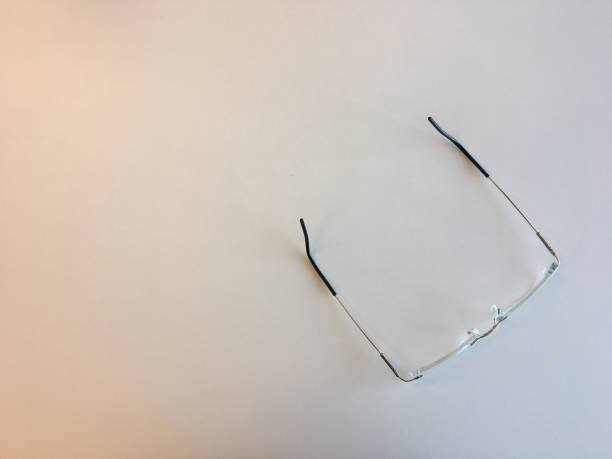 istock Titanium glasses on a white desk 1038786548