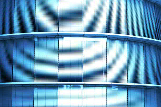 modern office building with windows and jalousie in blue toned