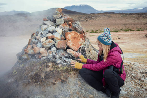 istock Admiring Hverarond Geothermal Area 1038830298