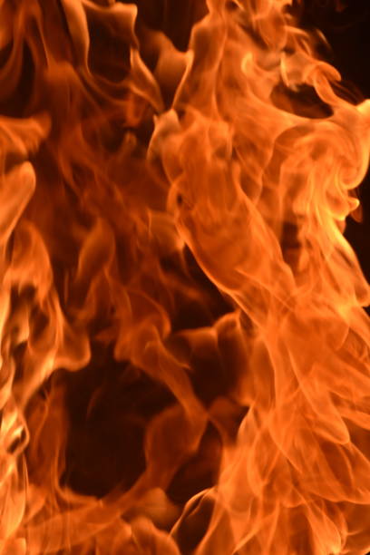 istock A pillar of fire against a black background 1038845314